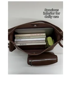 Deep brown bucket bag showing large interior capacity for tablets and daily items