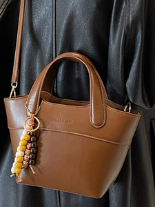 Retro coffee brown PU leather bucket bag with beaded charm and adjustable strap for women