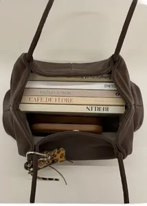 Top view showing the large capacity interior of this brown suede vintage tote bag