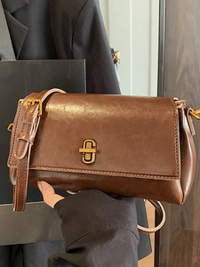 Borsa a tracolla vintage marrone scuro con chiusura dorata e finitura in pelle