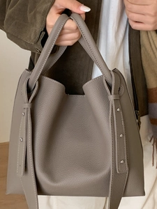 Large capacity taupe pebble leather tote bag with stylish shoulder straps for women