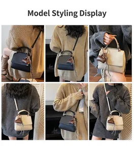 Detail shots of French style handbag in black and beige with woven straps and mini pendant