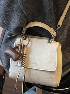 French style cream white pebble leather handbag with shoulder strap and mini charm
