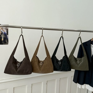 Minimalist vintage suede shoulder bags in four colors with wide straps and silver buckles