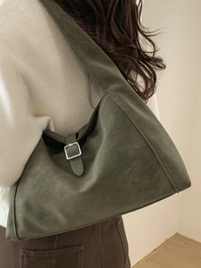 Olive green large faux suede shoulder bag with silver buckle and minimalist design