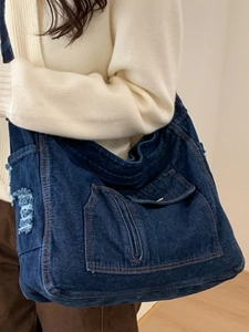 Retro deep blue denim tote bag with frayed edge details for daily commuting and school