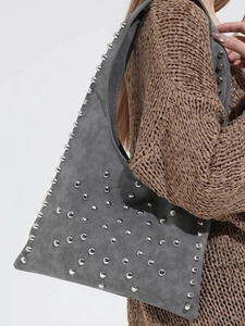 Vintage gray suede hobo bag with silver rivets and wide strap for stylish women