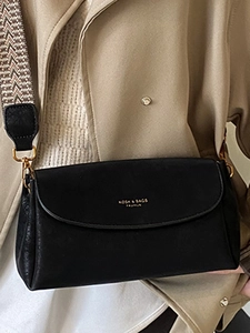 Sac bandoulière vintage noir en cuir grainé avec bandoulière à motif rétro