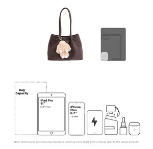 Large capacity vintage tote bag interior showing iPad and phone storage capacity