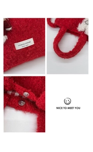 Close-up of winter red plush tote bag with magnetic closure and plaid lining detail