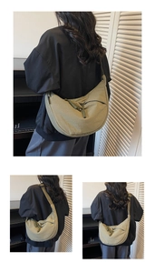 Detailed views of olive green canvas crescent bag with braided rope zipper pull design