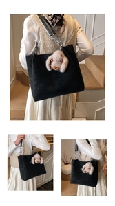 Detail of black tote bag with plush bunny charm and chain strap shown from multiple angles