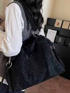 Black large capacity tote bag with daisy embroidery and silver metal rings for women