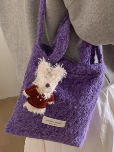 Purple plush knit tote bag with furry pendant for winter 2025 casual commuting