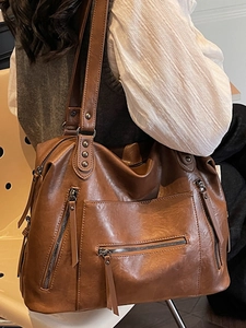Retro brown large capacity tote bag with rivets and multiple zippers for commuting women