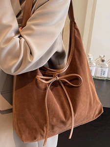 Vintage brown suede tote bag with leather bow decoration for professional women