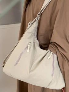 Grand sac fourre-tout en nylon blanc cassé avec poches zippées pour le trajet quotidien