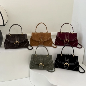 Five minimalist vintage handbag colors featuring suede texture and metallic round buckles