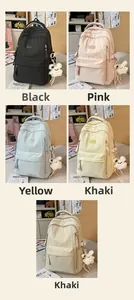Sacs à dos scolaires à motif étoiles en noir, rose, bleu, jaune et kaki avec lapin
