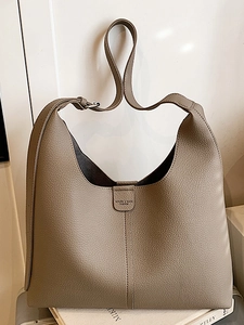 Minimalistische Hobo-Schultertasche mit großem Fassungsvermögen und dekorativem Riemen