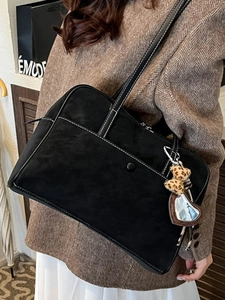 Retro black matte tote bag with white stitching and heart charm for office commuters