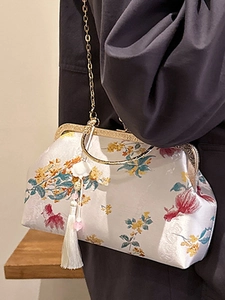 Elegant Chinese style embroidered evening bag with floral fish patterns and gold handle