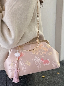 Vintage pink Chinese style embroidered handbag with floral patterns and pearl tassel