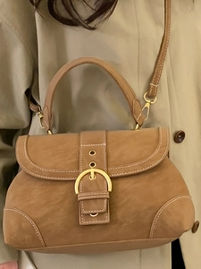 Retro brown suede handbag with large gold buckle and white contrast stitching detail