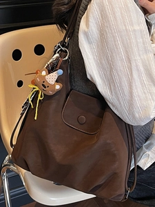 Vintage coffee brown tote bag with cute teddy bear charm for women's daily commuting
