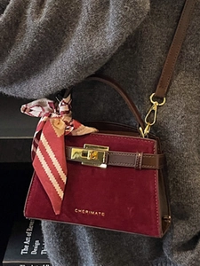 Vintage burgundy suede handbag with brown leather trim and printed silk scarf detail