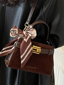 Retro dark brown suede crossbody bag with metal buckle and scarf-wrapped handle