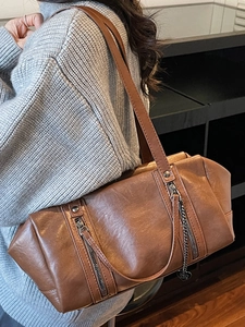 Deep brown faux leather tote bag for women with dual zippers and silver heart charm