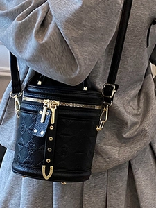 Retro black quilted bucket bag with litchi pattern leather and gold metal hardware