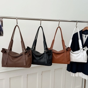 Minimalist large capacity faux leather tote bag available in four classic elegant colors