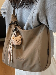 Brown large capacity commuter tote bag with letter embroidery and teddy bear charm