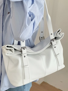Minimalist white pebbled leather tote bag with silver buckles for women's daily commute