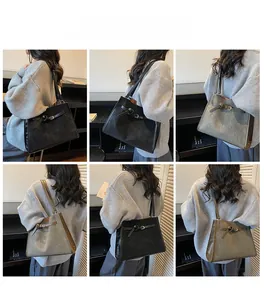 Detailed views of leather tote bag in black and olive green worn by model