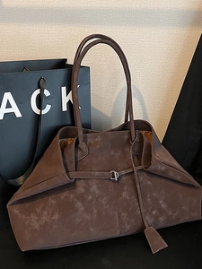 Brown frosted suede tote bag with long shoulder straps and metallic buckle detail