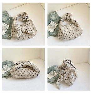 Plush heart-pattern shoulder bag with drawstring closure and bow detail shown in four angles