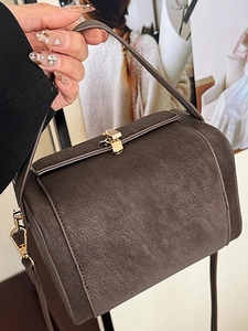 Sac à main cylindrique rétro en cuir marron avec fermoir métallique doré pour femme