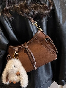 Retro brown suede square crossbody bag with plush rabbit pendant and metal buckle details