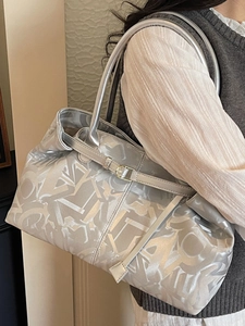 Silver metallic monogram tote bag with adjustable slim straps for stylish women