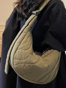 Olive green quilted puffer hobo bag with adjustable strap for women's crossbody style