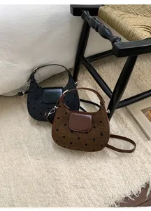 Sac hobo en tweed à pois avec broderie nœud et bandoulière en cuir élégante