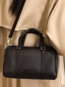 Dark brown pebble leather Boston handbag with adjustable shoulder strap and dual handles