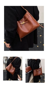 Vue détaillée d'un sac cabas vintage en cuir marron avec boucle métallique sur un mannequin
