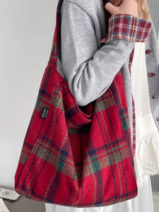 Classic red plaid oversized tote bag with vintage striped patterns and shoulder straps