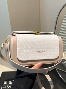 Fashionable minimalist square shoulder bag with beige leather and white canvas stitching