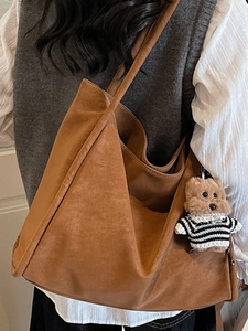 Retro brown suede tote bag with cute bear charm and adjustable shoulder strap for women