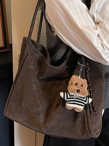 Retro dark brown faux suede tote bag with a cute bear pendant for winter fashion
